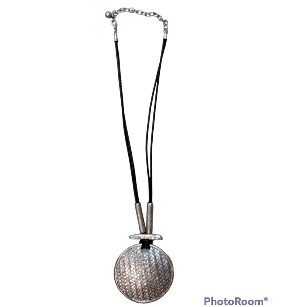 Necklace with black leather chain. Basket weaved round pendant Bold statement